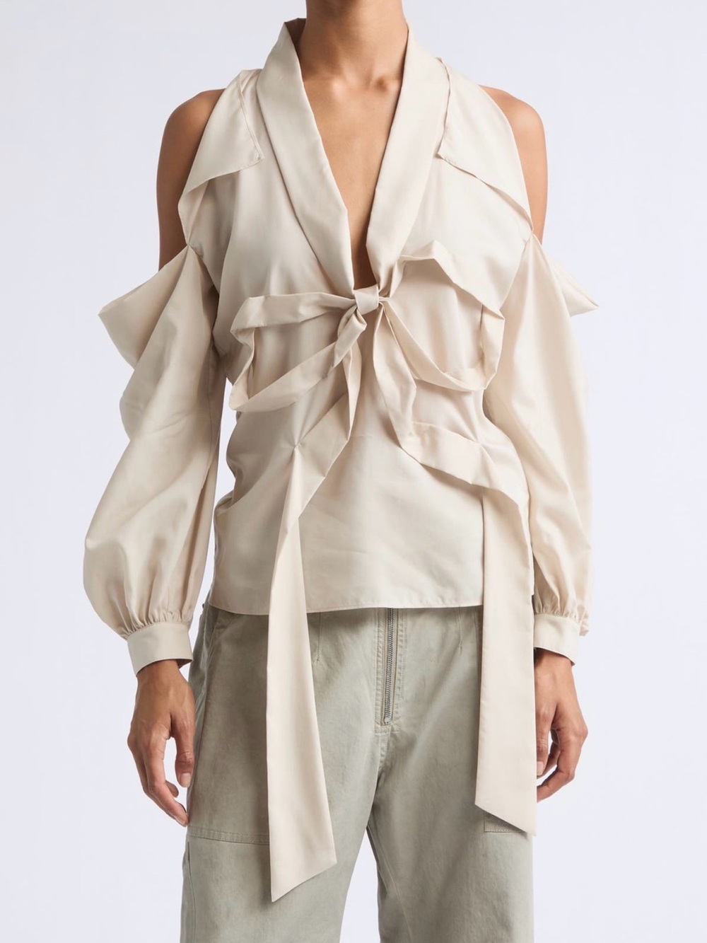 Acne Studios, Senny Bow Fluid Cold Shoulder Top
Color: Light Beige